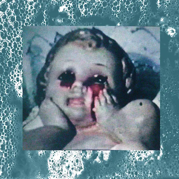 Collage de muñeca con lágrimas rojas